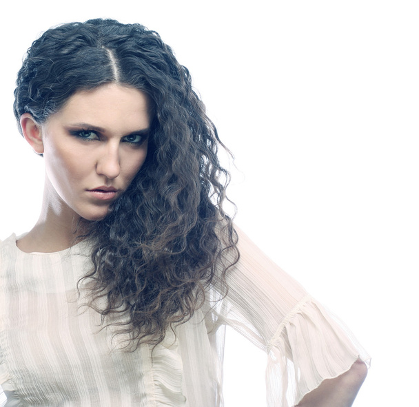 beautiful woman with long curly hairs - Fotó, kép
