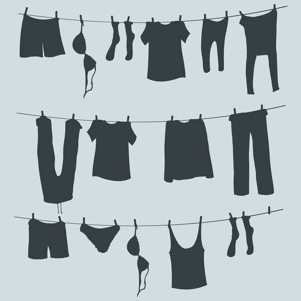 Silhuetas de lavanderia em uma corda
 - Vetor, Imagem