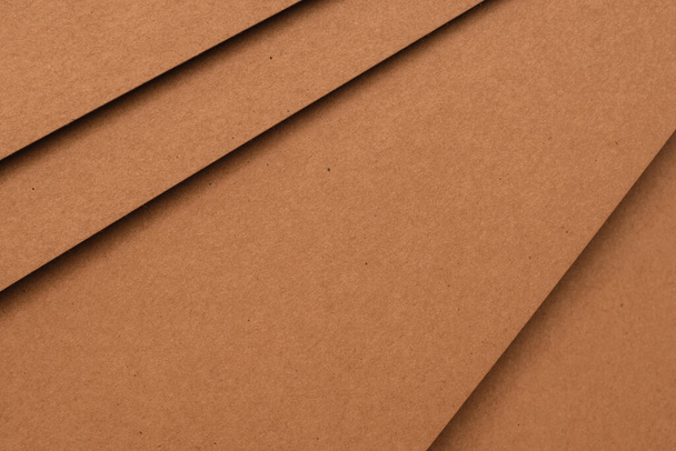 Abstract brown paper background geometric cardboard sheet - Foto, afbeelding