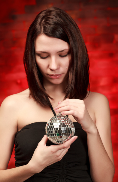 Beautiful girl with decoration ball - Foto, afbeelding