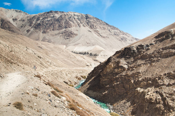 The landscape of Wakhan corridor - the narrow land between Afganistan and Tajikistan. River Pyandzh is a border. Pamir mountains, Asia - Φωτογραφία, εικόνα