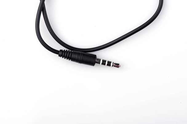 black wired headphones on a white background. vacuum headphones - Photo, Image
