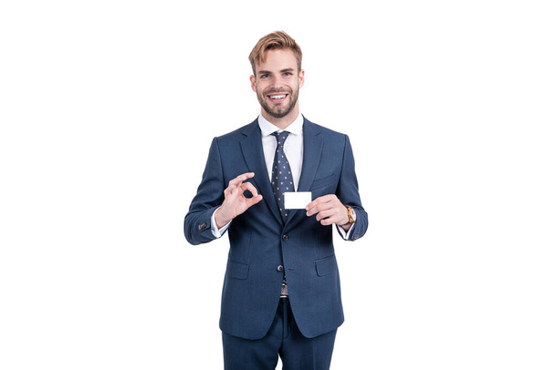businessman man showing empty credit or debit business card with ok gesture, copy space, business. - Zdjęcie, obraz