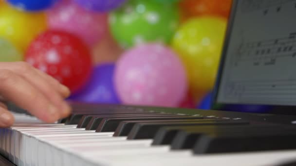 Playing keyboard piano with notes - Footage, Video