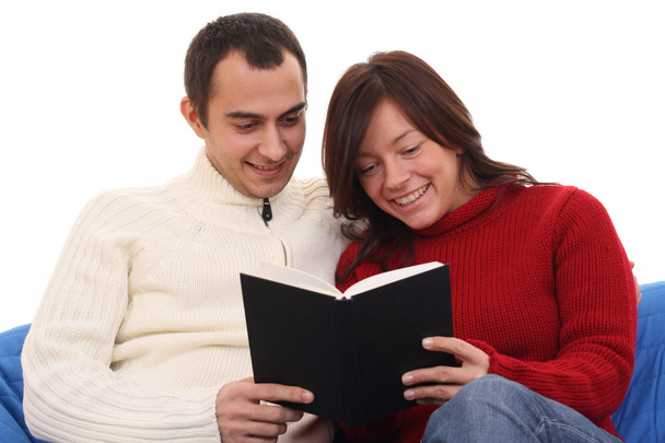 женщина и мужчина веселятся с книгой - изолированы на белом
 - Фото, изображение