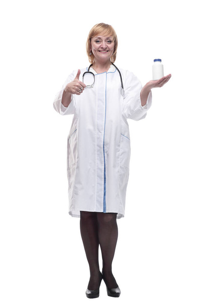 in full growth.friendly female doctor with sanitizer in hand. - Foto, imagen