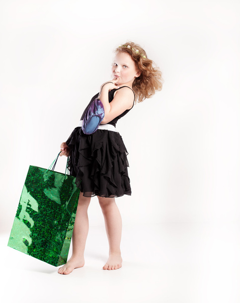 Little cute girl shopping. - Фото, зображення