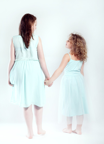 Conceptual photo of young sisters - Photo, Image