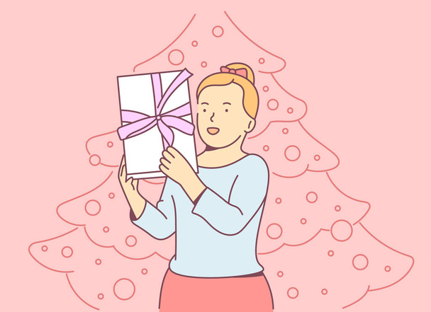 Christmas or New year concept. Young cheerful blonde girl holding gift box and rejoices. Christmas holiday celebration, winter season tradition.	 - Vector, Imagen