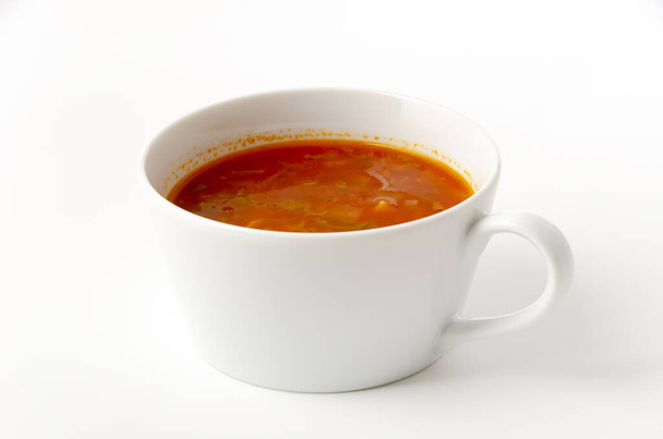 Minestrone soup in the cup on white background - Fotó, kép