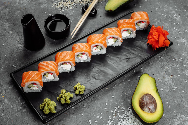Sushi Philadelphia on a stone decorative plate. - Photo, Image