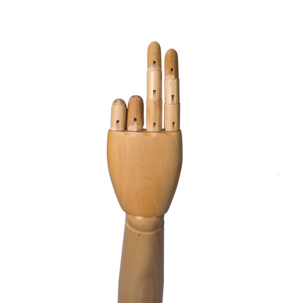 Wooden hand of a mannequin with raised two fingers isolated on white background - Foto, imagen