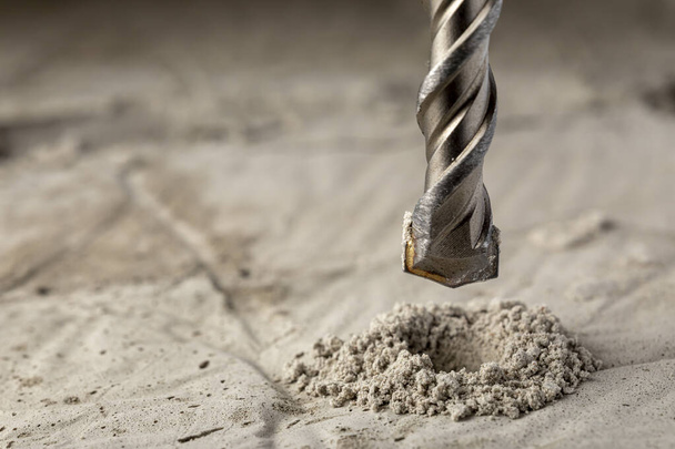 Drill bit for drilling concrete masonry or stone. Metal work industry. - 写真・画像