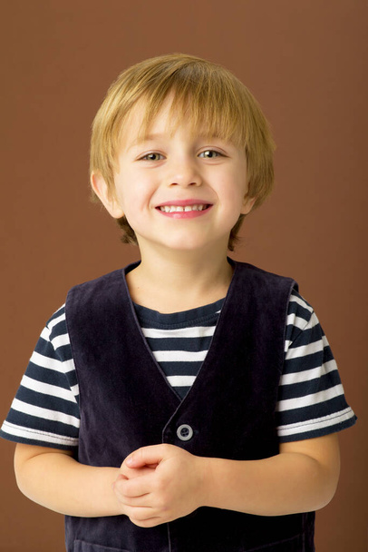 Portrait of happy joyful little boy - 写真・画像