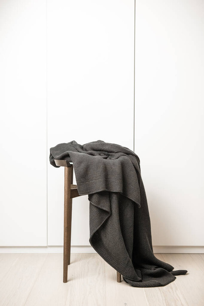 plain gray plaid in luxury interior minimalism on the chai - Фото, зображення
