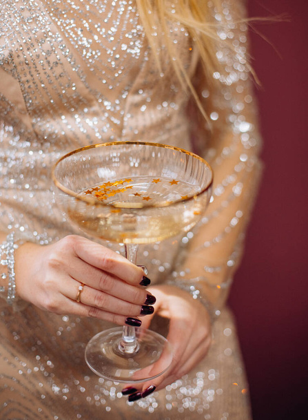 glamor woman shiny dress with champagne new year christmas time celebratio - Foto, afbeelding