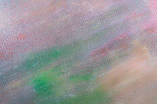 fond créatif abstrait coloré toile de lin brut inégalement recouvert d'apprêts multicolores, reflets de lumière. Tonifiant, flou, focalisation sélective. Objet temporaire.  - Photo, image