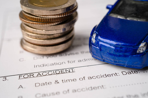 car and coins on Insurance claim accident car form background, Car loan, Finance, saving money, insurance and leasing time concepts. - Photo, Image