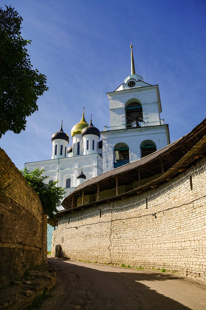 Fortress wall and zahab in Trinity tower of the medieval Pskov Kremlin. Pskov, Russia - Photo, Image
