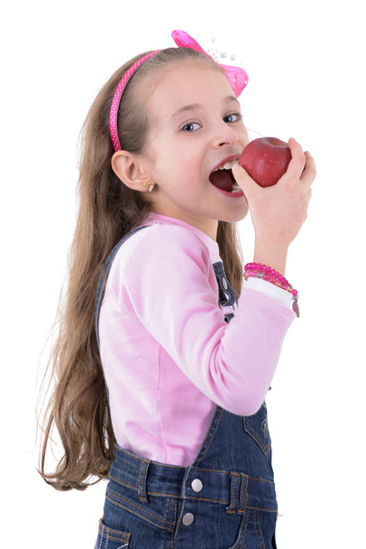 Молода блондинка їсть яблуко
 - Фото, зображення