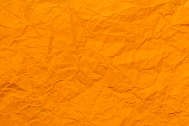 papel naranja arrugado para el fondo - Foto, Imagen