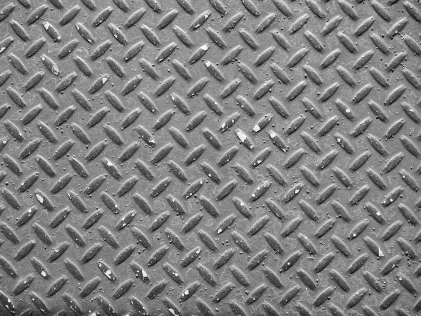 graue Stahlstruktur nützlich als Hintergrund in Schwarz und Weiß - Foto, Bild