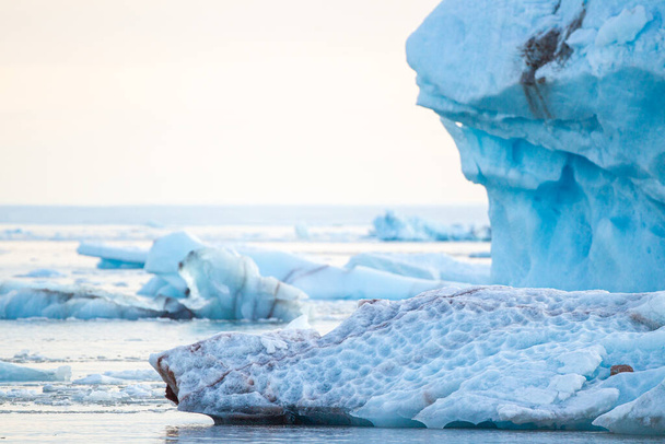 Abstract Glacial ice floating in the Arctic ocean - Φωτογραφία, εικόνα