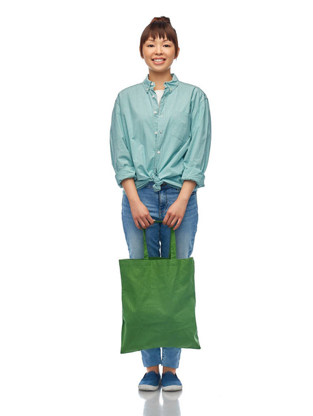 woman with reusable canvas bag for food shopping - Photo, Image