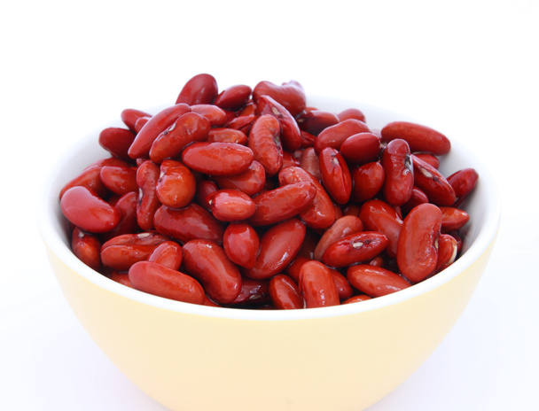 Many cooked red beans in yeallow bowl on white background - Photo, Image