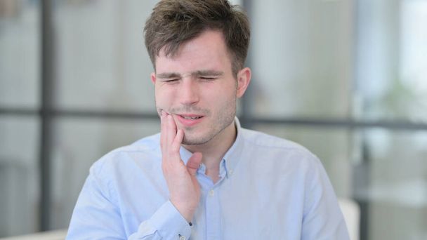 Portrait of Attractive Young Man having Toothache, Cavity - Фото, изображение