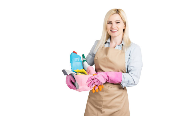 Young housewife with cleaning supplies, isolated on white background - Photo, Image