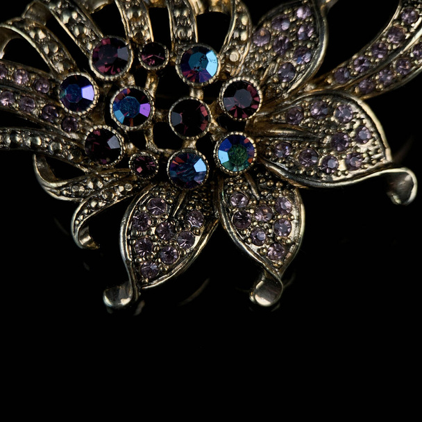 brooch close-up. antique jewelry close-up with gemstone - Photo, Image
