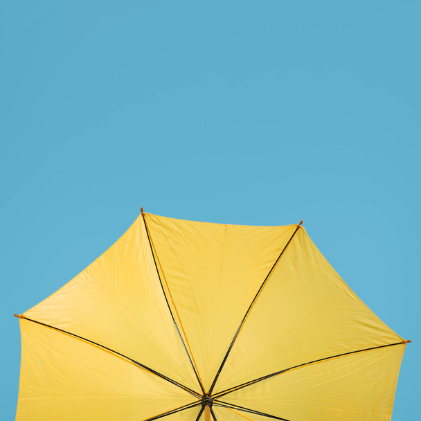 copy space yellow umbrella. Resolution and high quality beautiful photo - Zdjęcie, obraz