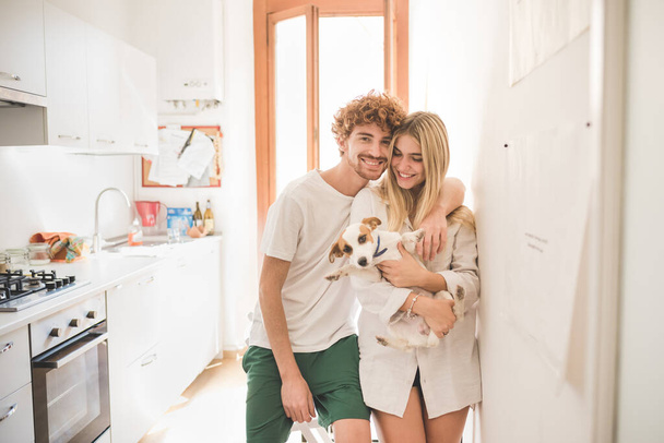 Young couple in love with dog - Photo, Image