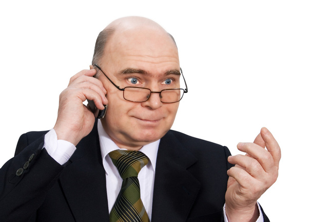 Man in business suit talking on a cell phone. white background. - Fotó, kép