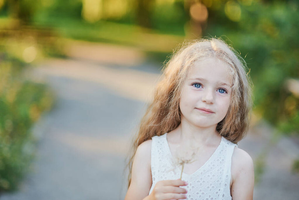 Summer portrait of girl with big dandelion. Close up photo of flower. Allergy free concept. Freedom - Foto, immagini