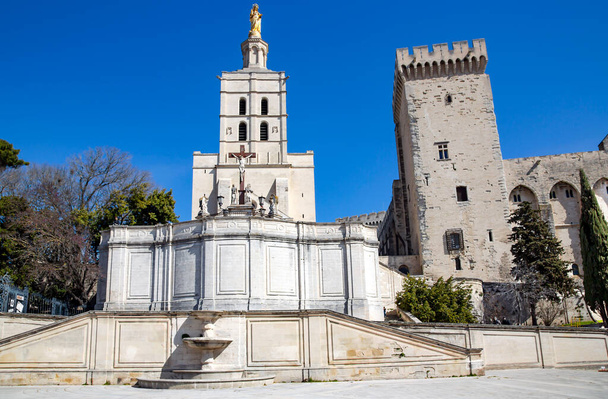 The Palais des Papes dominates the Avignon city, the surrounding remparts and the remains of a 12th-century bridge over the Rhone. - Photo, Image