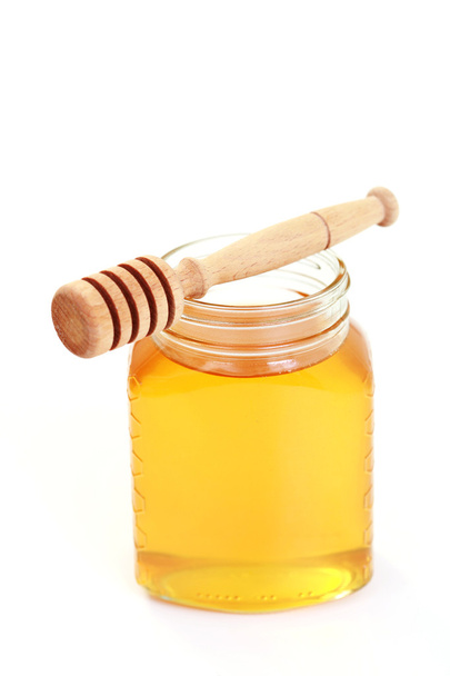 jar of honey on white background - sweet food - Photo, image