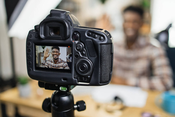 Afro american blogger using video camera for work - Fotoğraf, Görsel