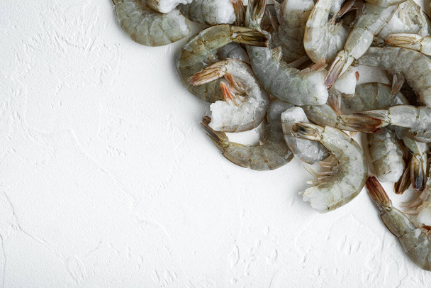 Fresh tiger shrimps, prawns set, on white stone  surface, with copy space for text - Photo, image