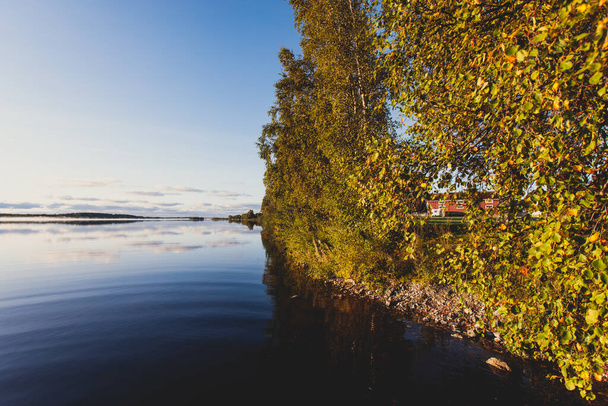 View of Kem River, Kemijoki, in a Liedakkala village in the municipality of Keminmaa in Lapland in north-western Finland, beautiful summer dawn sunrise - Foto, Bild