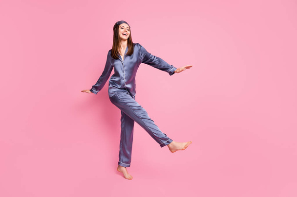 Photo portrait full body view of gorgeous woman dancing isolated on pastel pink colored background - Valokuva, kuva
