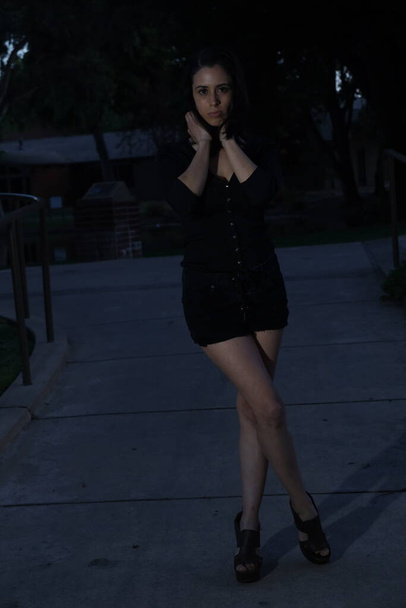 Photoshoot of a Hispanic model in a park - Photo, image