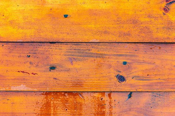 Wet wooden planks. Wooden flooring after rain. - Foto, afbeelding