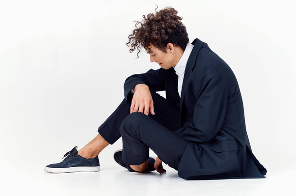 business man curly hair self confidence suit modern style - Valokuva, kuva