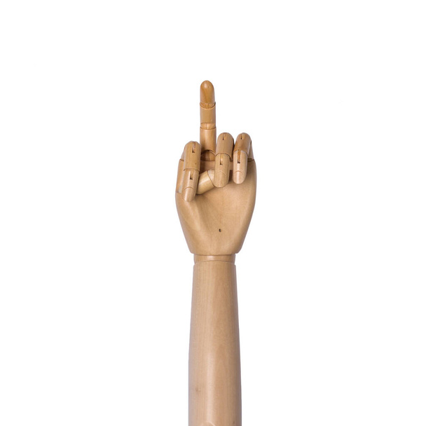 Backside of hand of wooden mannequin with open middle finger, isolated on white background - Fotó, kép