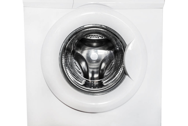 Close-up of a washing machine on a white background. Closed hatch of the washing machine. - Photo, Image