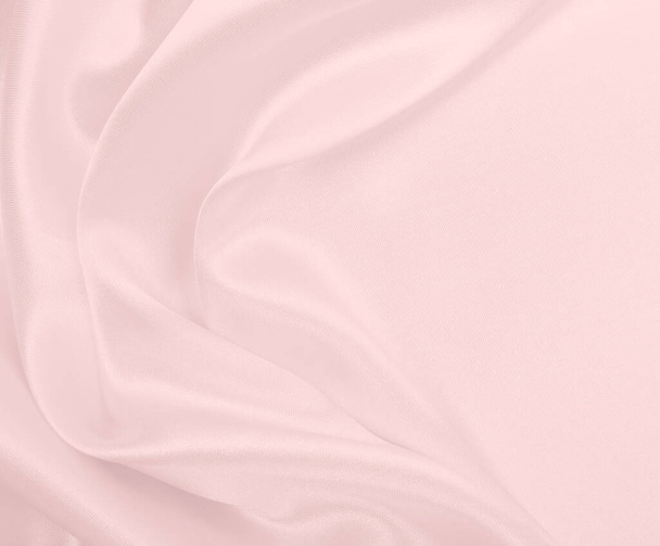 Smooth elegant pink silk or satin texture can use as wedding background. Luxurious background design - Photo, Image