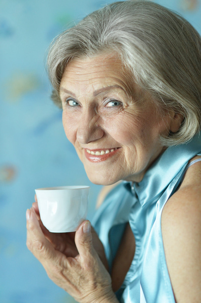 Senior woman with cup - Zdjęcie, obraz