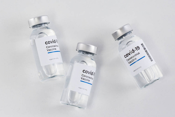 covid 19 vaccine, white background - Фото, изображение